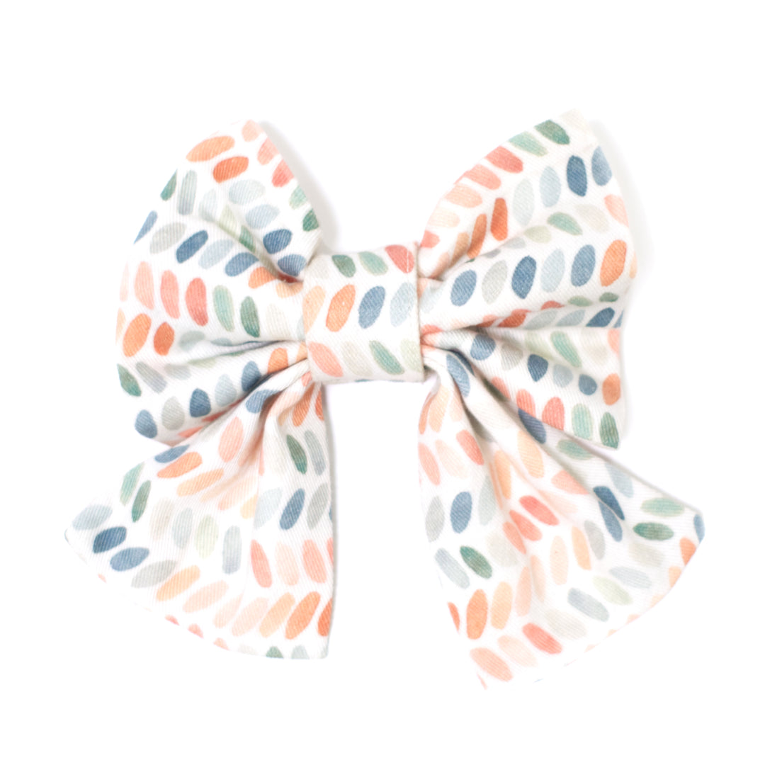 Sailor dog bow in modern multi-color dot print.