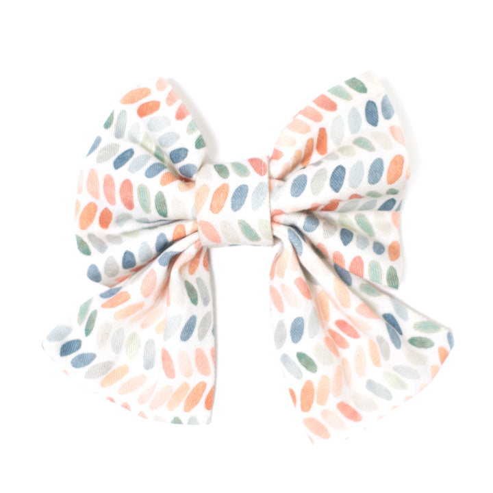 Sailor dog bow in modern multi-color dot print.